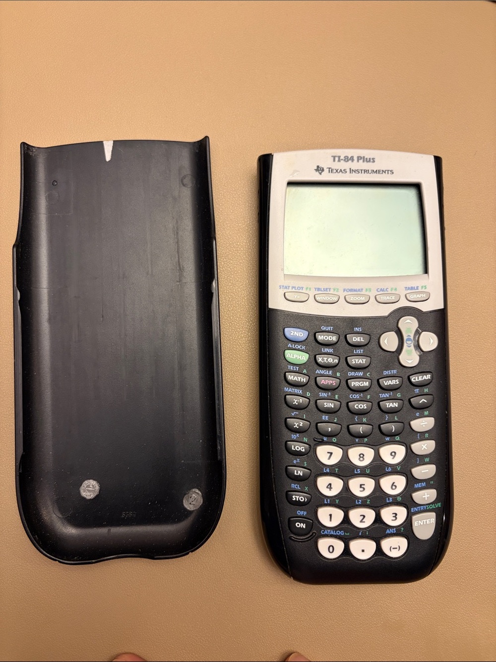 Texas Instruments TI-84 Plus Graphing Calculator in Black and White